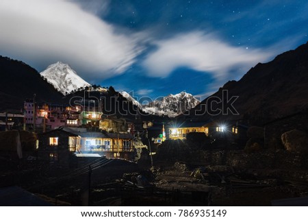 Lho-Nepal-December 2017 : Lho village at night. Manaslu circuit trek with a mount Manaslu in background.