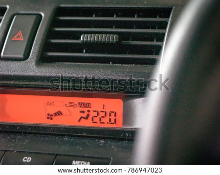 The front of the car, the temperature inside the car.