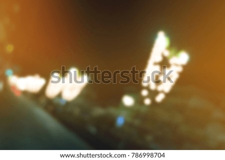 retro vintage blur background of night town city with bokeh for background