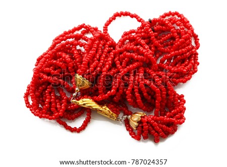 red coral Necklace on white background Royalty-Free Stock Photo #787024357