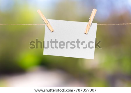 Blank paper notes with copy space pinned on rope 