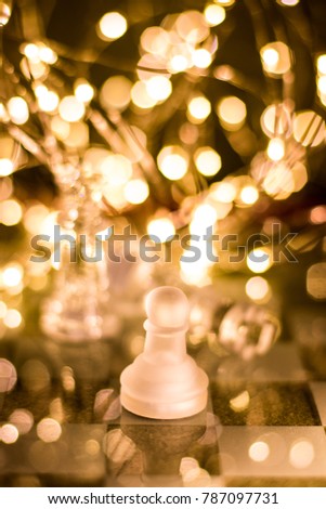 Glass chess with bokeh effect
