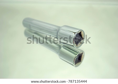 ratchet socket wrench coupling extension on mirror