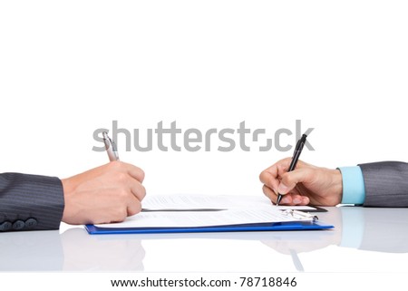 Hands of business people in elegant suits sitting at desk working in team together, with documents sign up contract, on clipboard, folder with papers, business plan. Isolated over white background.