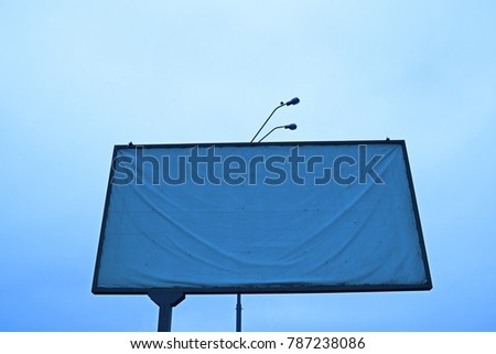 Bottom view of a clean billboard against the sky