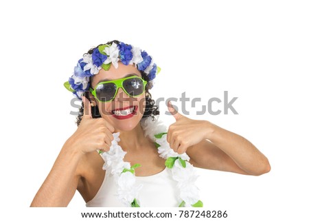 Black woman gesturing with hand, thumbs up. Affirmative, Positive, Happy. Brazilian teenager is dressed for Carnival in Brazil. Crown and necklace of Hawaiian flowers. Green Sunglasses. 