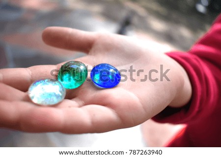 Hand Holding Gemstones