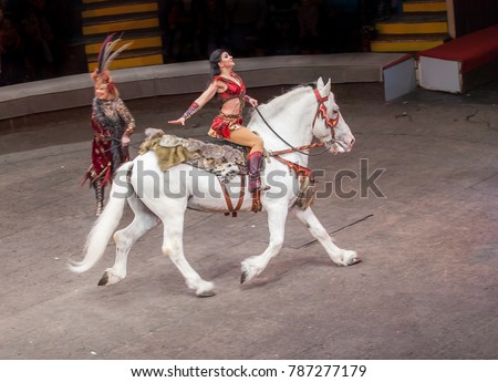 performance in a circus girl on a horse
