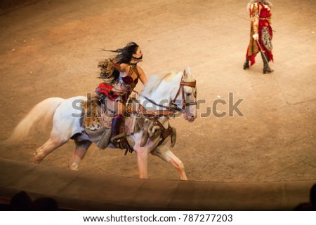 performance in a circus girl on a horse
