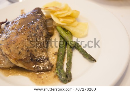 Lamb with potatoes and asparagus Spain