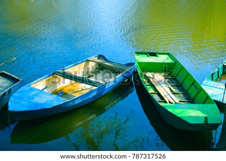 Two fishing boats on the river