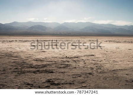 View of a salt desert from badwater basin, Death Valley National Park - California Royalty-Free Stock Photo #787347241
