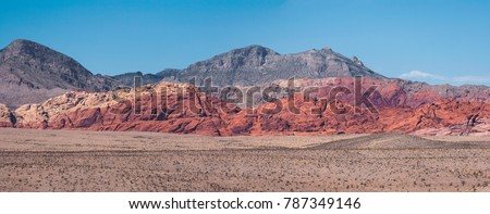 Panoramic view of hills of the Red Rock Canyon (Nevada), during a sunny day of summer. Royalty-Free Stock Photo #787349146