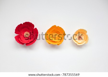 Colorful handmade paper flowers, isolated, on white background for wedding invitation or birthday card. 