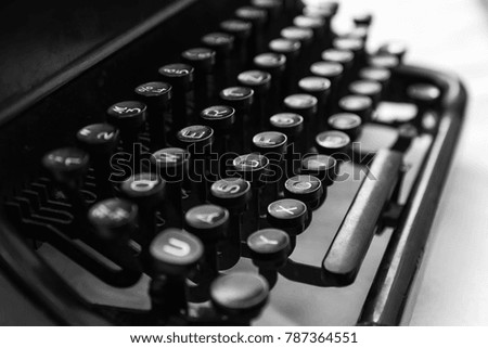 Old manual typewriter machine keyboard, photo with soft selective focus