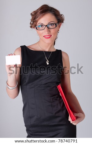 Businesswoman with blank business card and red folder.