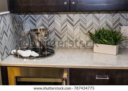 Modern Kitchen Counter With Backsplash Royalty-Free Stock Photo #787434775