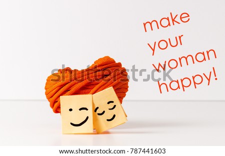 hugging little smileys with big heart and text: make your woman happy!
