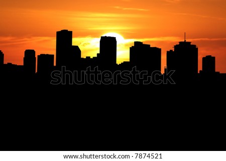 New Orleans skyline at sunset with beautiful sky