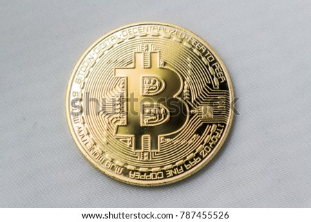 Bitcoins and New Virtual money concept.Gold and silver coins for business sell and trade. Bit coin Mining or block chain technology for crypto currency. Modern electronic money for virtual exchange.