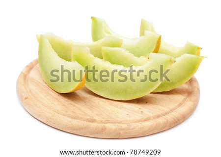 slices of fresh melon on cutting board and empty space for your text