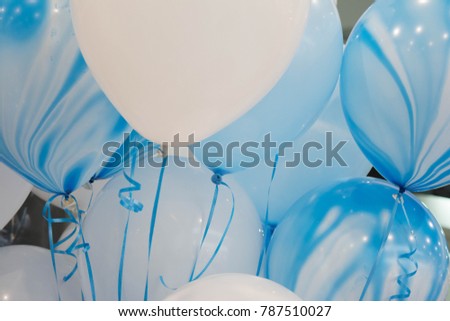 Close up image of colorful balloons with light spots