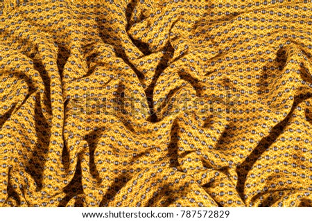Fabric cotton is brown with a pattern of circles. Smooth and chic but still on the wild side, do not miss this Python Printed Stretch Cotton Sateen With a smooth crisp hand this cotton shows diamonds