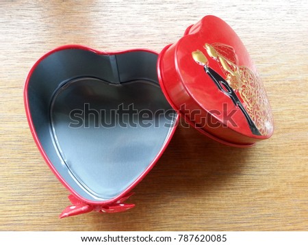 Heart-shaped gift box,red open the lid on the table,Valentine's gift.
