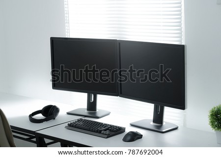 Clean Workspace using Dual Monitor Setup Royalty-Free Stock Photo #787692004