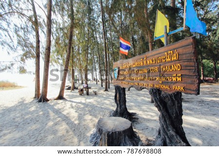 sign board with the flags at phiphi island thailand