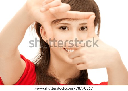 picture of teenage girl creating a frame with fingers