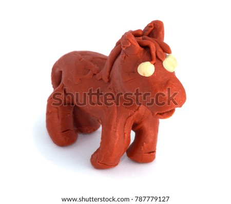 Isolated play dough brown horse on white