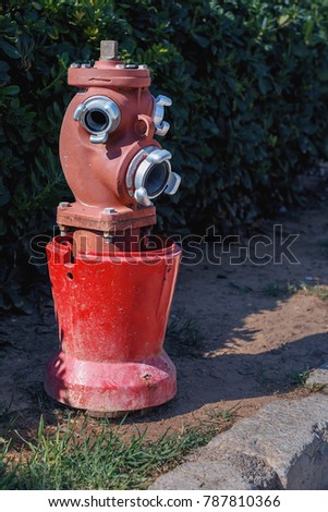 old street fire hydrant to extinguish a fire closeup