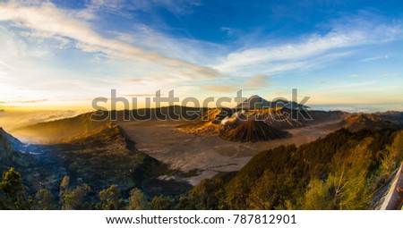 Mount Bromo volcano (Gunung Bromo) during sunrise from viewpoint on Mount Penanjakan. Mount Bromo Tengger Semeru National Park, East Java, Indonesia.