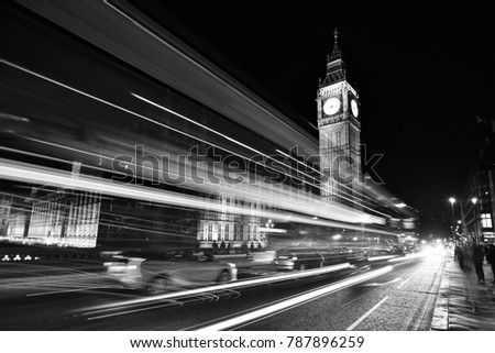 Big Ben at night with light trails