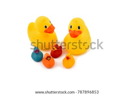 Rubber duck family stock images. Toy rubber duck family isolated on a white background. Set of colorful ducks