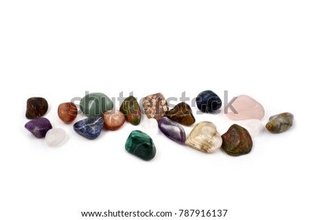 Gemstone stock images. Collection of many different natural gemstones. Gems on a white background