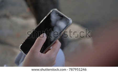 Hand with gadget and mobile phone