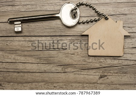 House key with wooden house key chain