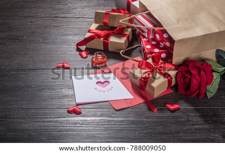 Valentines day background, Valentines day card with roses and gifts on wooden board