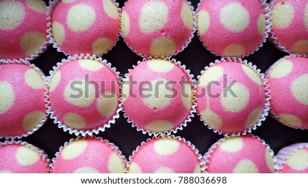 Freshly baked cute steamed cupcake on sisplay for sale