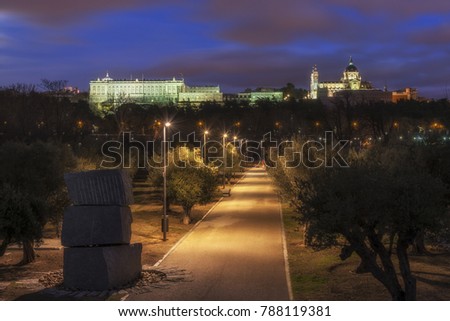 Night view of Madrid Cathedral Santa Maria la Real and the Royal Palace from the Park "Casa de Campo". Spain.