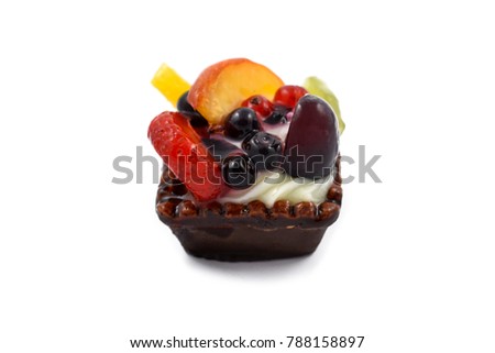 Fruit cake stock images. Fruit tart on a white background. Fruit tart mini. Fruit cup with cream