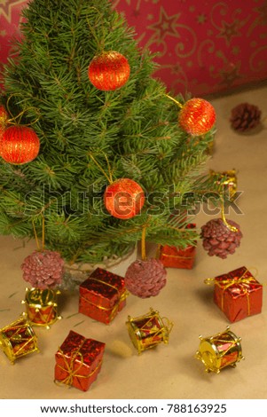 Christmas tree with toys on a red background
