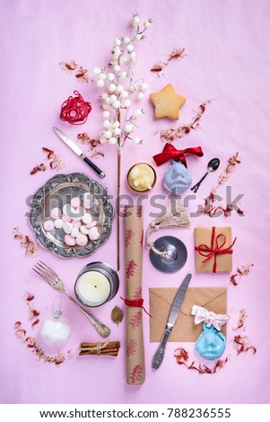Baking or cooking ingredients arranged. Kitchen items for baking cakes. Kitchen utensils, flour, eggs, almond, cinnamon, oil. Text space, top view. 