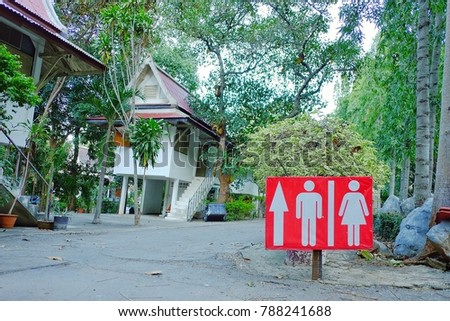 Way, sign to toilet in temple 