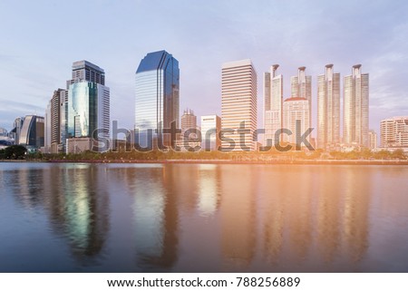 Office building with water reflection, cityscape downtown background