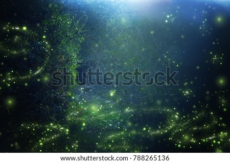 Abstract and magical image of Firefly flying in the night forest. Fairy tale concept Royalty-Free Stock Photo #788265136