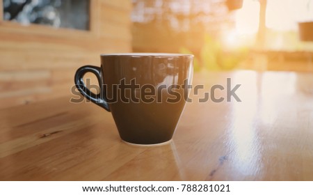 coffee cup at office background or student workplace. E-learning, self-education concept