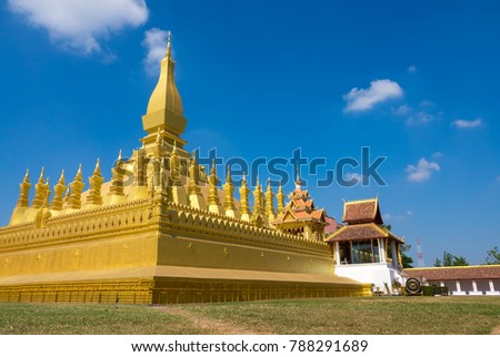 Royalty high quality free stock image of Pha That Luang. Pha That Luang is a gold-covered large Buddhist stupa and be the most important national monument in Lao and a national symbol .Vientiane, Laos